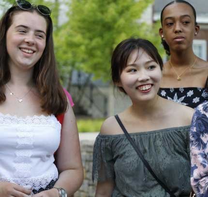 diverse group of smiling students